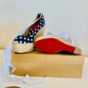 Christian Louboutin lace up polka dot platforms
